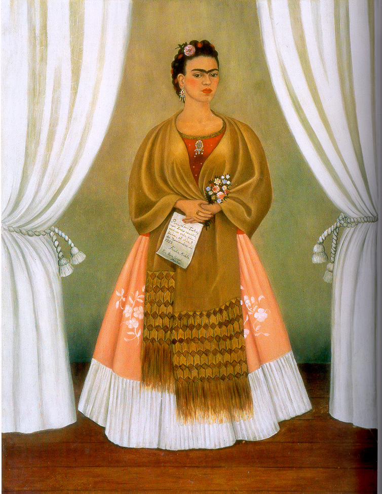 The artist stands in a stage-like space framed by white curtains. Beneath black hair woven with red yarn and flowers, heavy brows accent her dark-eyed gaze. Clad in a fringed, honey-toned shawl; long, pink skirt; and gold jewelry, she holds a bouquet and a handwritten letter.