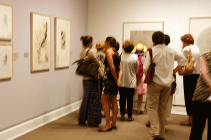 NMWA visitors in Pressing Ideas: Fifty Years of Women's Lithographs from Tamarind