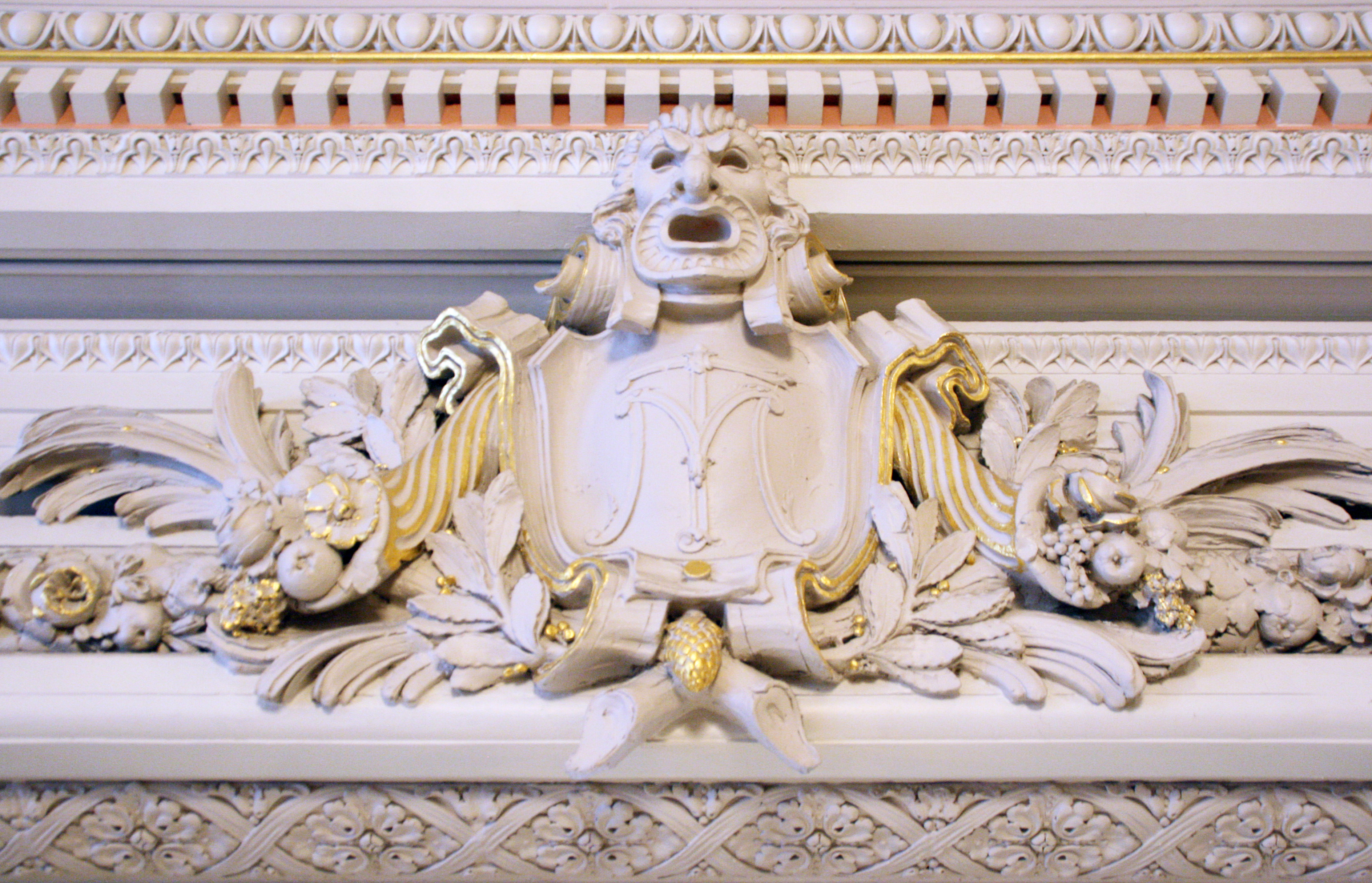 Close-up of a relief on a building.