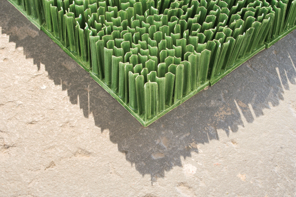 Dawn Holder, Monoculture (detail), 2013; Porcelain, 2 ½ x 92 x 176 in.; Courtesy of the artist; On view in Organic Matters