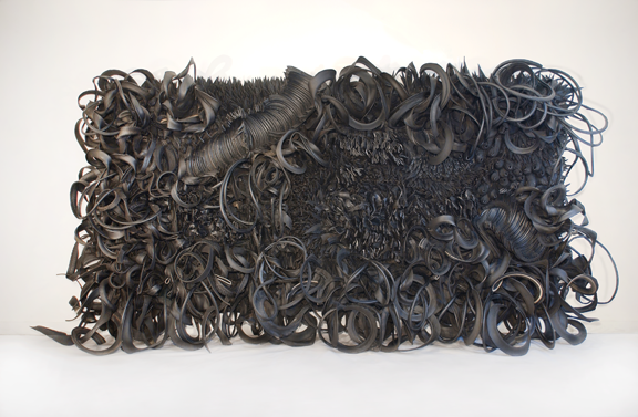 Chakaia Booker, Acid Rain, 2001; Rubber and wood, 120 x 240 x 36 in.; NMWA, Museum purchase: Members’ Acquisition Fund