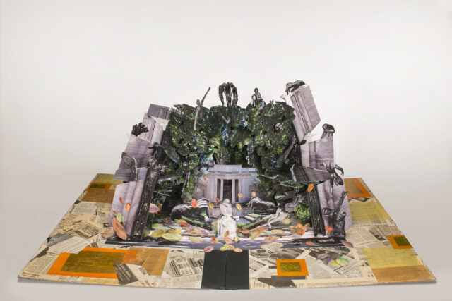 Large-scale pop-up book with Auguste Rodin's and Camille Claudel's sculptures in a deconstructed classical building. Sculptures populate a mass of greenery that overtakes the building, bordered by crumbling columns. Scattered petals of color match the collaged newspaper base.