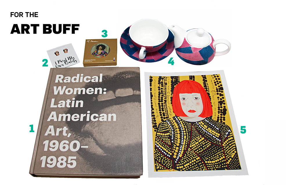 A photograph consisting of six objects arranged against a white background. The objects are a book titled "Radical Women: Latin American Art, 1960-1985," an abstract illustration of Yayoi Kusama wearing yellow polkadot clothing and a red wig, a teacup and matching teapot decorated with a blue and pink geometric pattern, a pair of stud earrings in the shape of Frida Kahlo's face, and a pocket mirror that features an image medium-dark skinned woman with an Afro hairstyle.