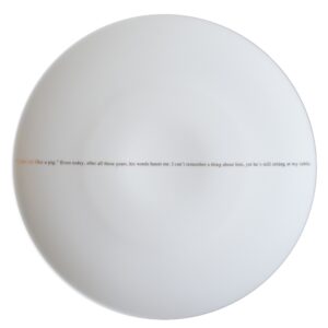 A white plate with text in black.