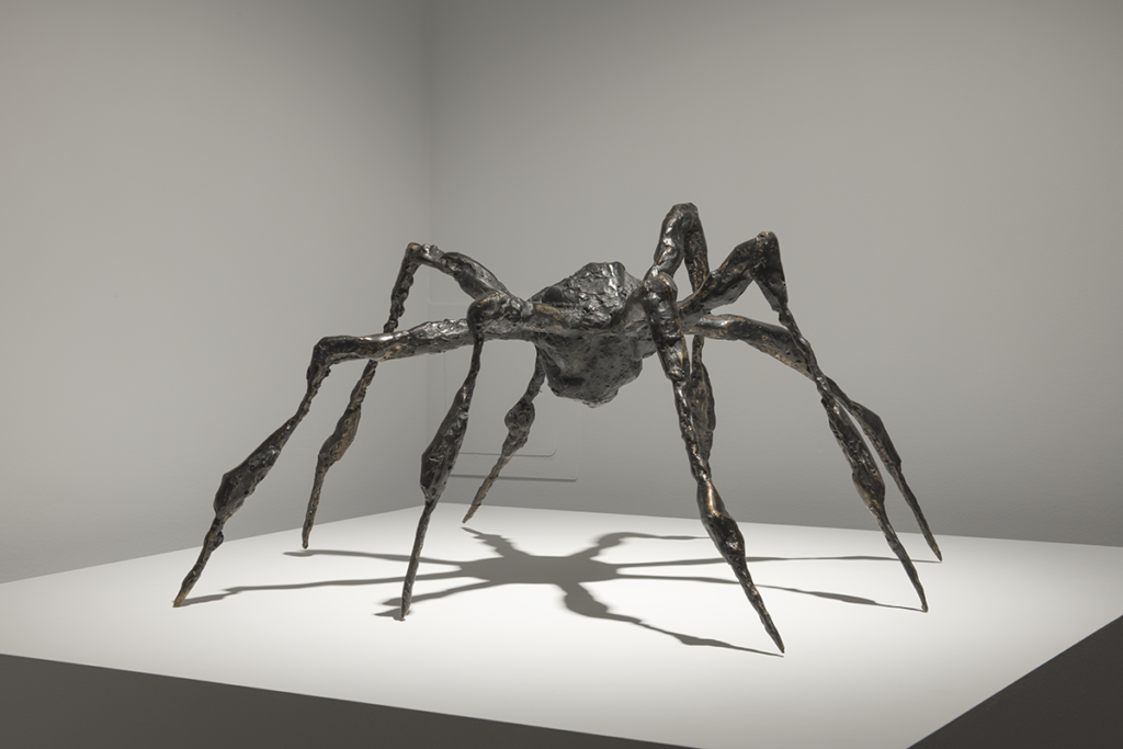 A bronze sculpture of a spider.