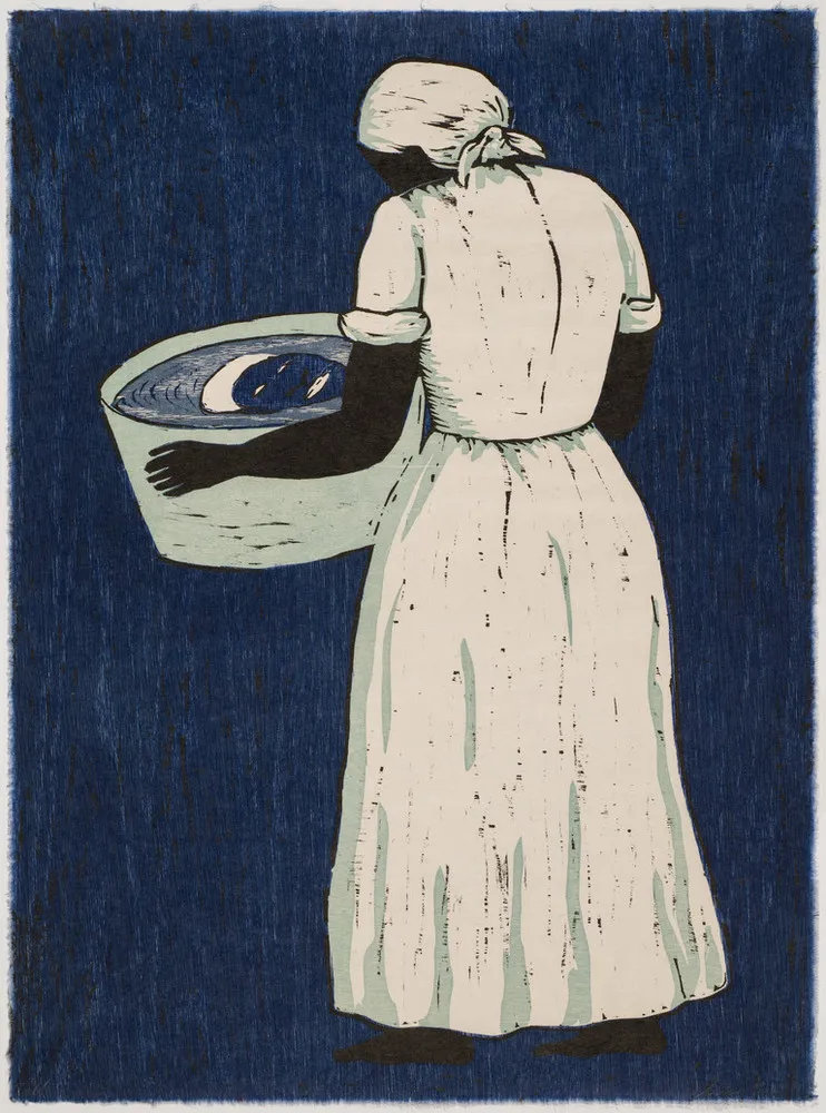 A woodcut print shows a barefoot African American woman from the back at a slight angle wearing a white dress and headwrap and holding a washtub. Her face is visible only via the reflection in the tub water. The print’s background and the woman’s reflection are both rendered in blue ink.