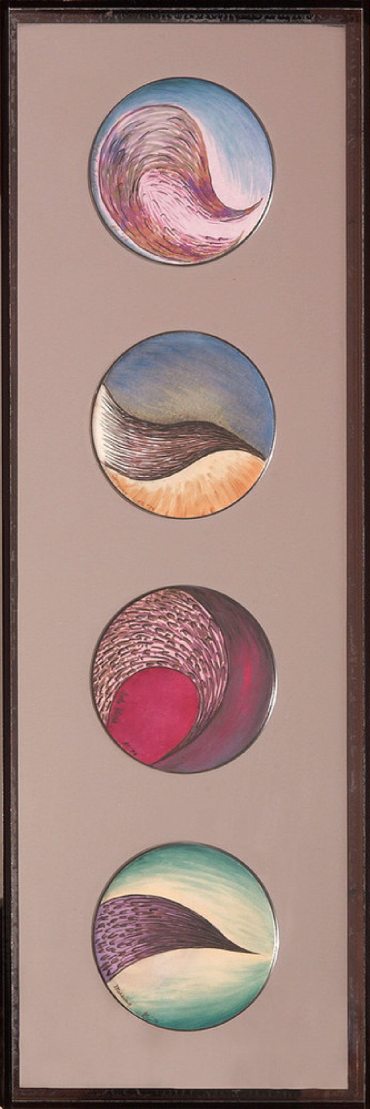Four painted plates are displayed vertically against a mauve background within a brown frame. Each plate is painted with colorful swirls of pink, blue, brown, sand, and green. The painted shapes suggest abstract landscapes or organic forms.