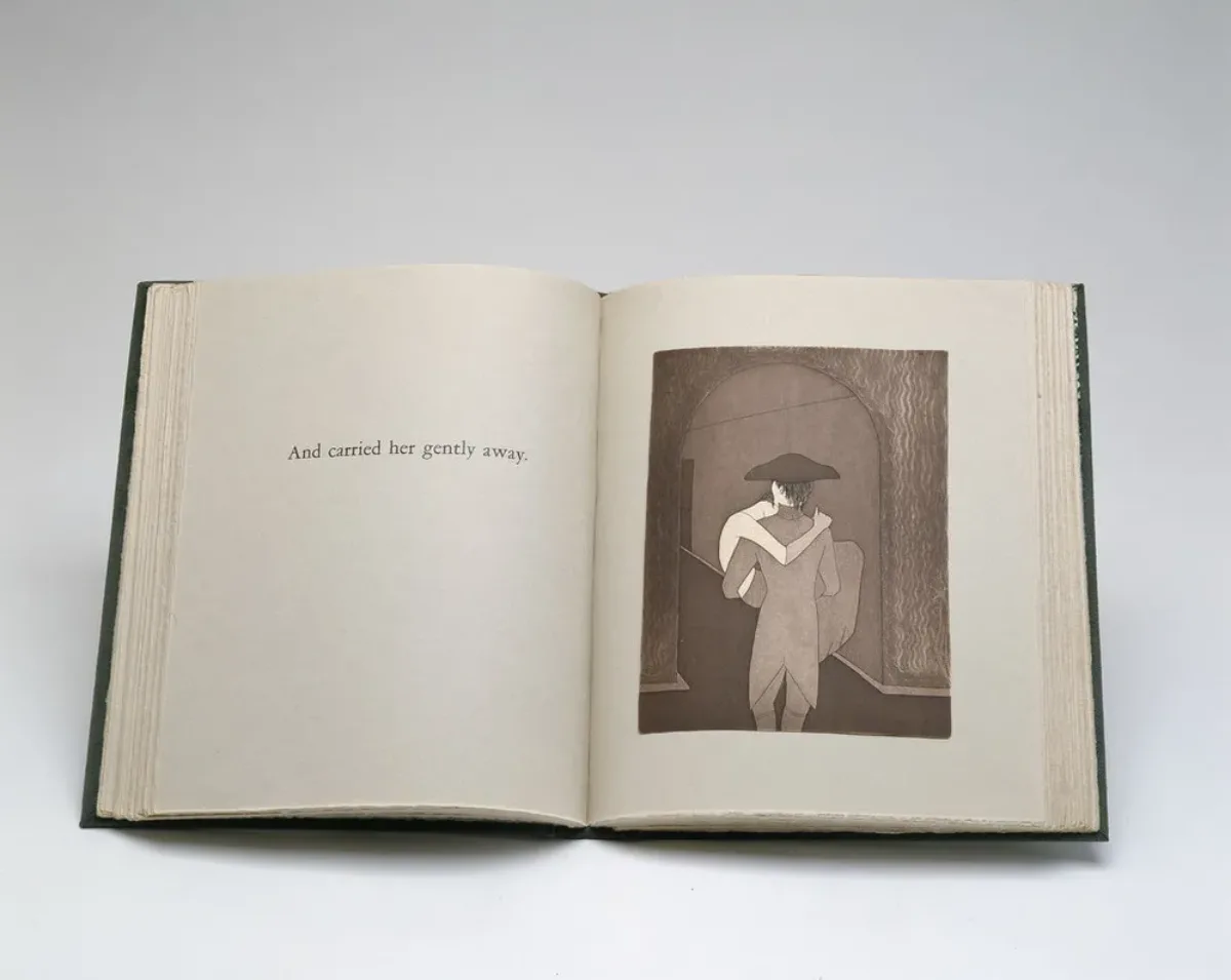 Visual novel, open to a black and white print depicting a man with his back to the viewer, wearing a hat and coat with tails, carrying a woman in his arms, her arm draped around his neck and legs hanging loosely. The opposite page reads, "And carried her gently away."