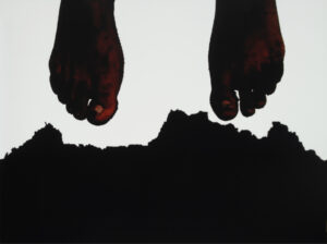 Two dark-skin-toned feet hang down from the top of the frame. The feet are covered in soil and mounded up just below them soil breaks up from the bottom of the frame.