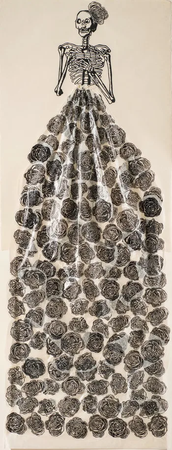 A very tall and narrow, black-and-white print pictures a skeleton with folded arms, a rose fascinator perched on its head. The figure wears a collaged, three-dimensional, billowing skirt made of tissue and printed with roses.
