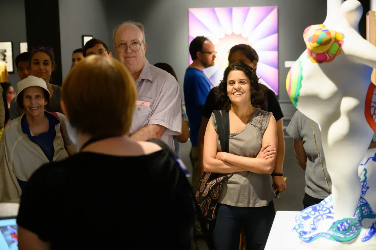 Museum visitors enjoying a tour.