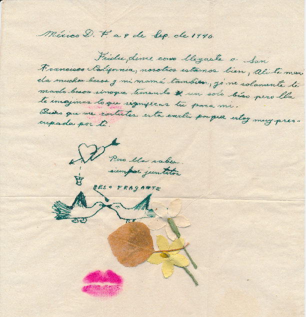 A brief note, handwritten in Spanish in green ink on yellowed paper, dated September 9, 1940. Beneath the closing, drawings of two hearts connected by an arrow and two birds beak to beak, along with two collaged flowers and a leaf, and a bright pink lipstick imprint.