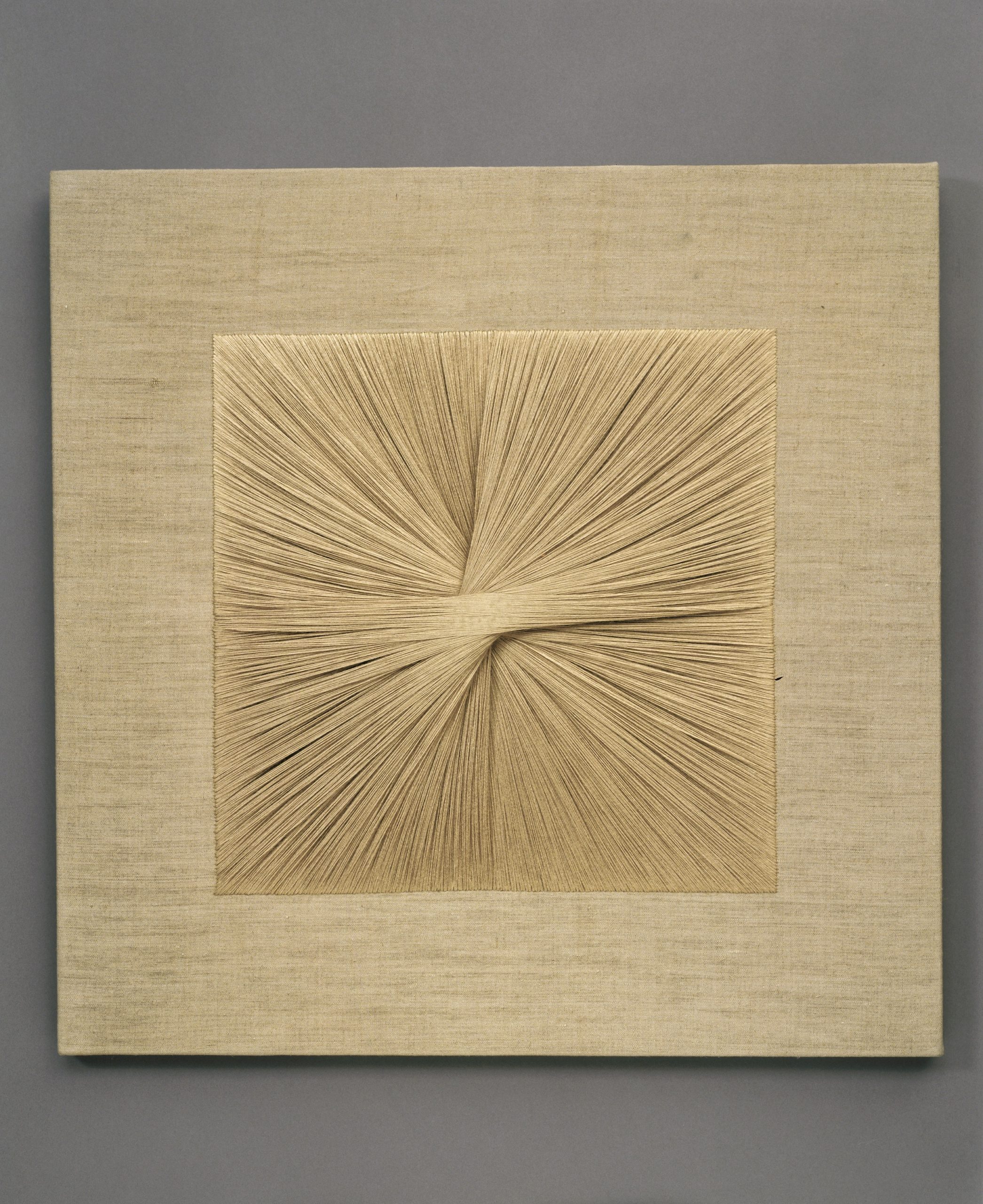 Square textile panel uses beige thread to create a starburst pattern as the central focus.