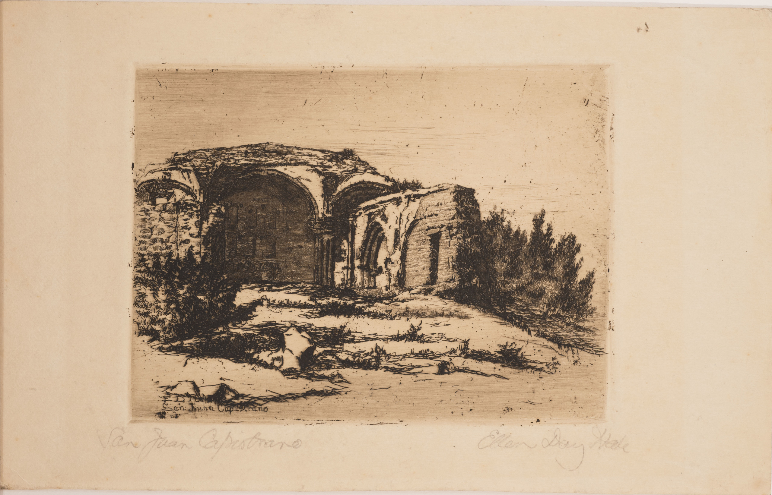 Small print of black ink on ecru paper depicting the ruins of an old Catholic mission building. The building, featuring rounded arches, crumbling facades, and exposed brick, is surrounded by scrub bushes and desert landscape.