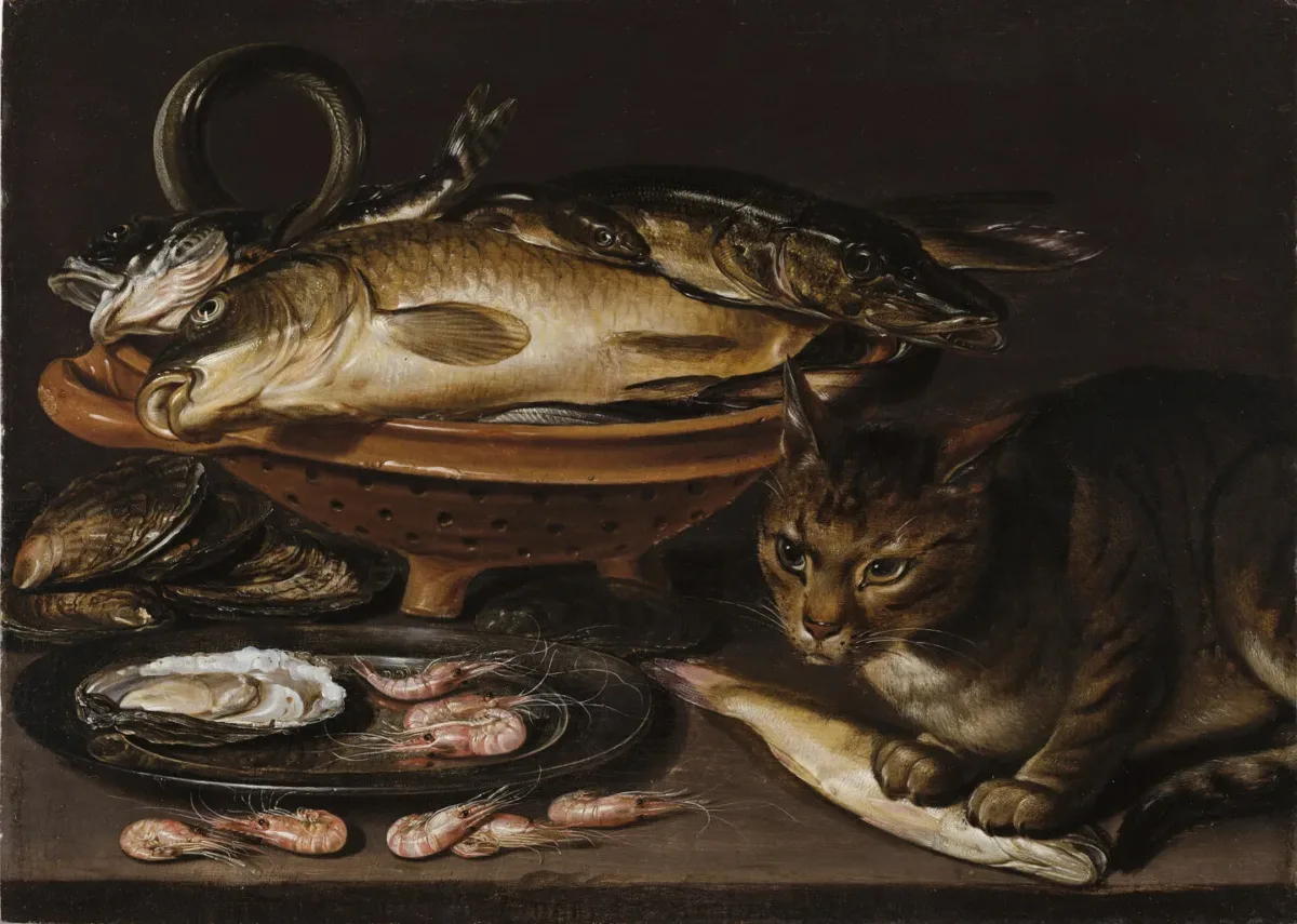 Still life painting features a reddish ceramic colander with several types of fish. In the foreground, a cat stands alert next to shrimp and oyster shells on a gleaming pewter dish.