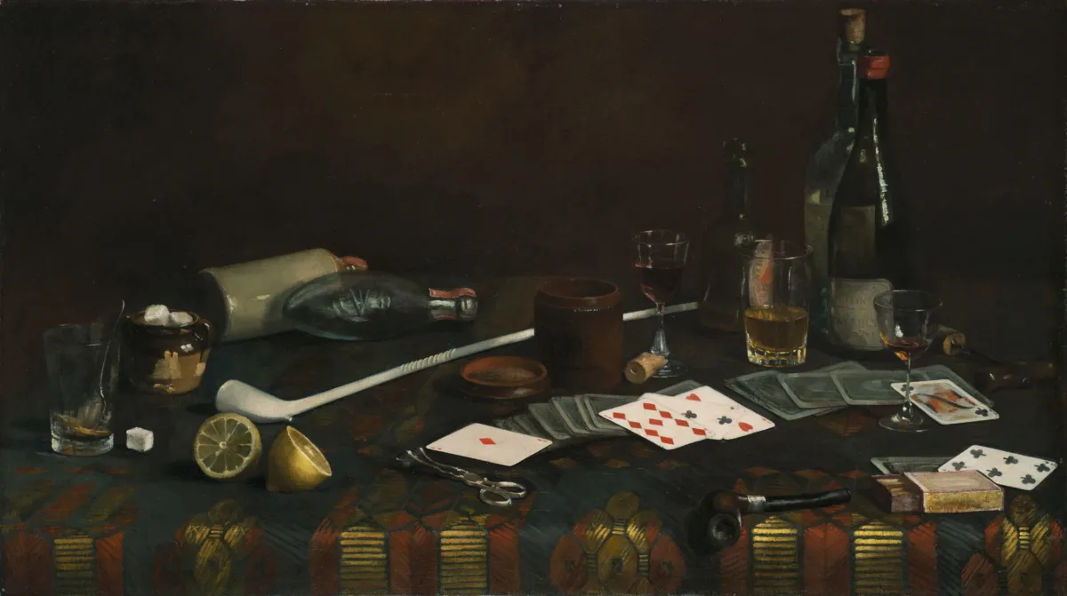 Painting of a blue tablecloth with gold and red pattern. Strewn across the top are half-empty glasses of wine and brown liquid, playing cards, lemon halves and matches. Two pipes, one long and white, one small and dark, lie next to a container of sugar cubes, corks, and bottles.