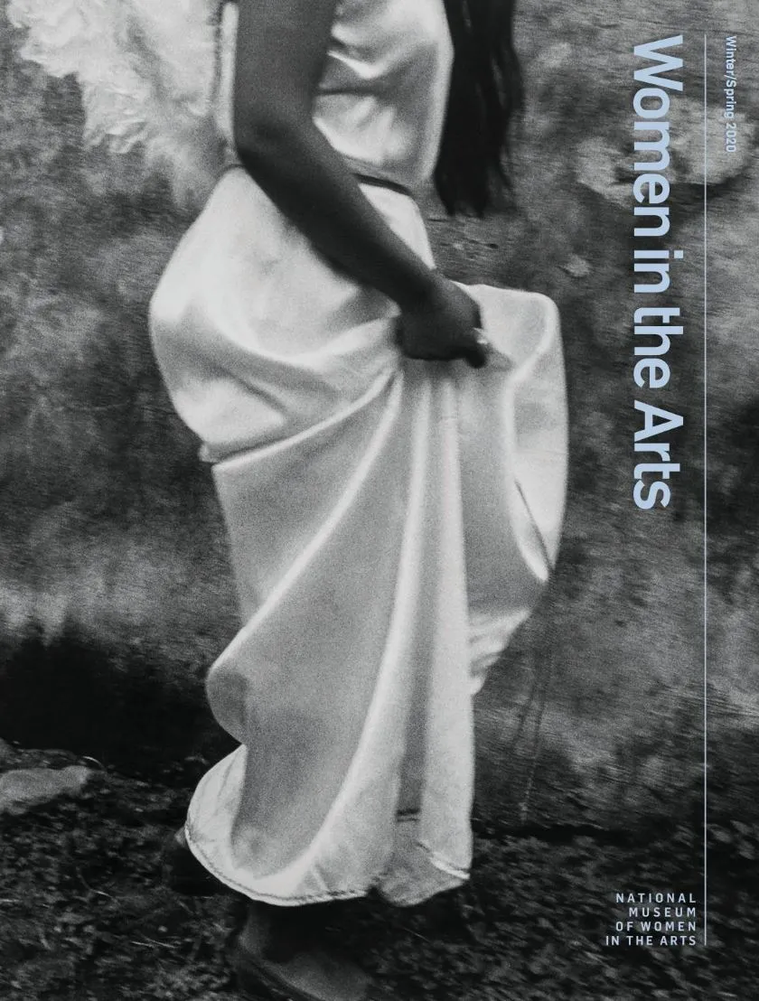 The Winter/Spring cover 2020 image for 'Women in the Arts' magazine shows a black and white photo of a woman from the shoulders down with long hair walking to the viewers right.