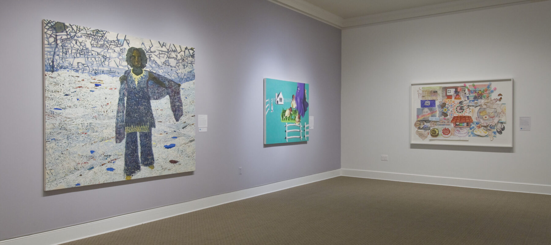 Two large paintings hang on a lavender wall. In the first, a dark-skinned woman stands in a white landscape, and in the other, a fence, house, and large birds float on a solid turquoise background. On the other white wall is an abstract multimedia work with houses, cakes, and patterns.