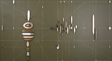 Abstract wall sculpture featuring horizontal, vertical, and diagonal intersecting lines overlaid with pieces of rounded, plated steel