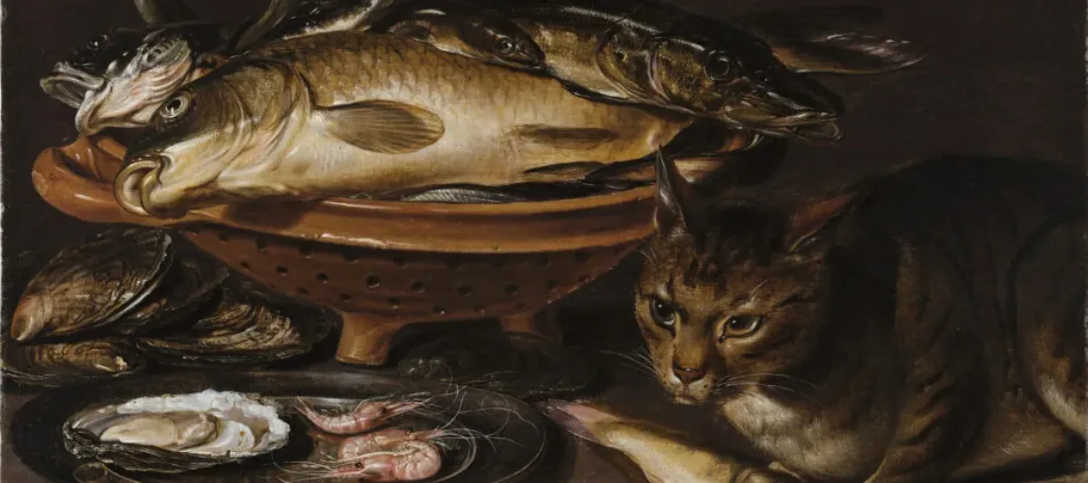 Still life painting features a reddish ceramic colander with several types of fish. In the foreground, a cat stands alert next to shrimp and oyster shells on a gleaming pewter dish.