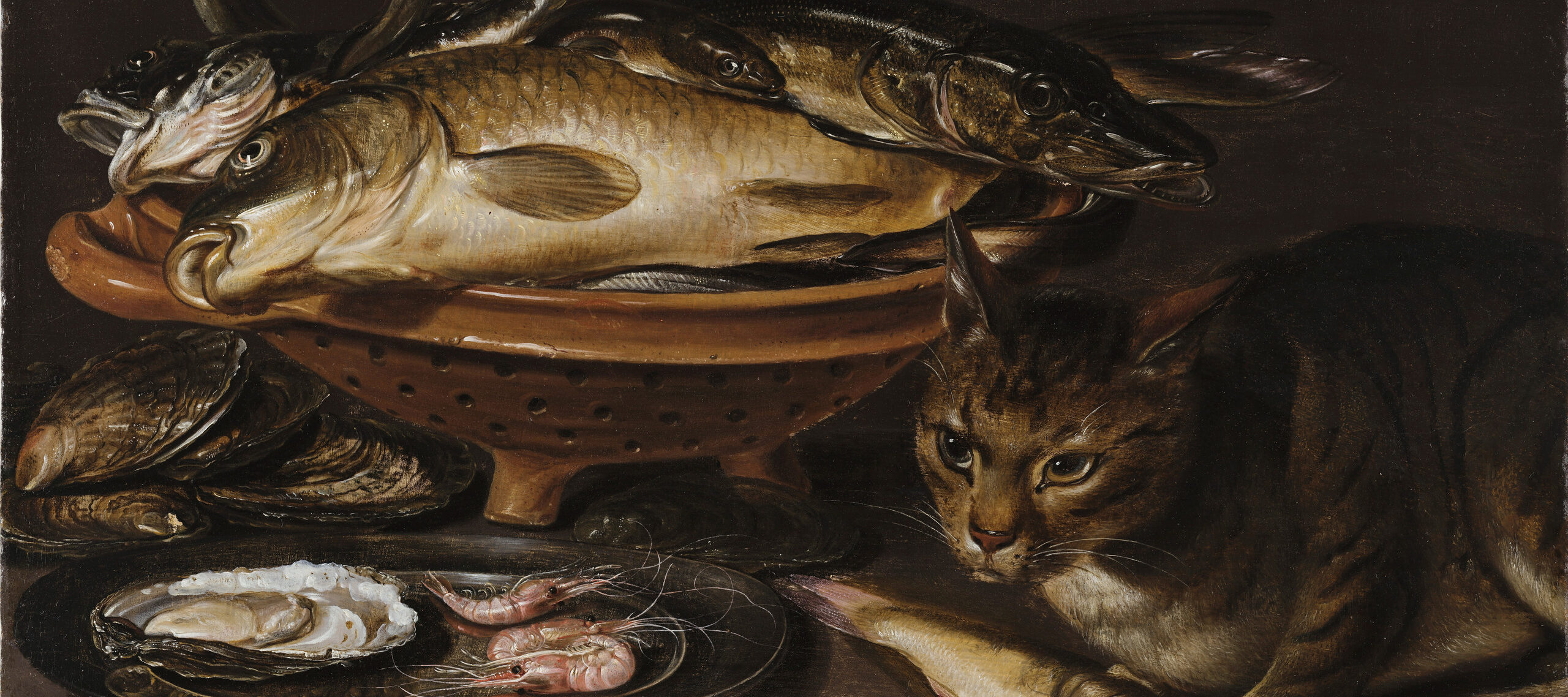 Still life painting features a reddish ceramic colander with several types of fish. In the foreground, a cat stands alert next to shrimp and oyster shells on a gleaming pewter dish.