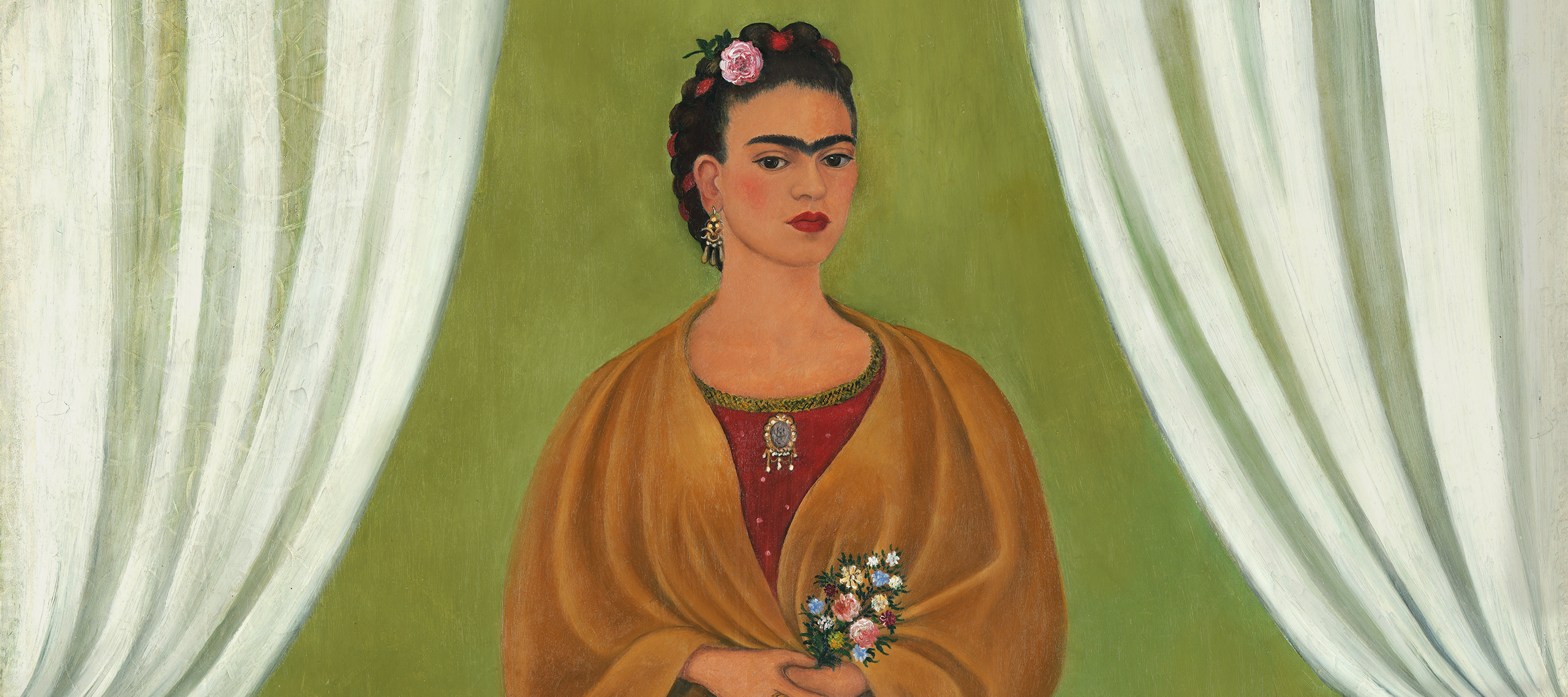 In a painted self-portrait, the artist stands in a stage-like space framed by white curtains. Beneath black hair woven with red yarn and flowers, heavy brows accent her dark-eyed gaze. Clad in a fringed, honey-toned shawl; long, pink skirt; and gold jewelry, she holds a bouquet and a handwritten letter.