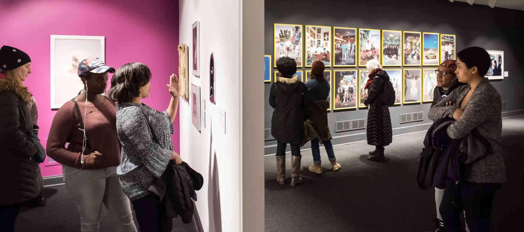 Eight diverse women museum visitors are scattered throughout the NMWA collection galleries browsing the art on the walls.