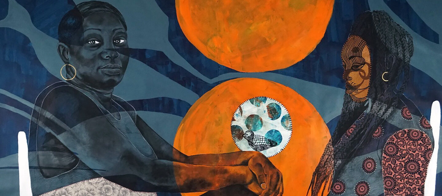 A mixed-media work shows two seated figures facing each other; the first woman sits cross-legged staring confidently out at viewer while the second woman is masked and gazes elsewhere. In the background blue abstract shapes with two orange orbs fill the space between them.