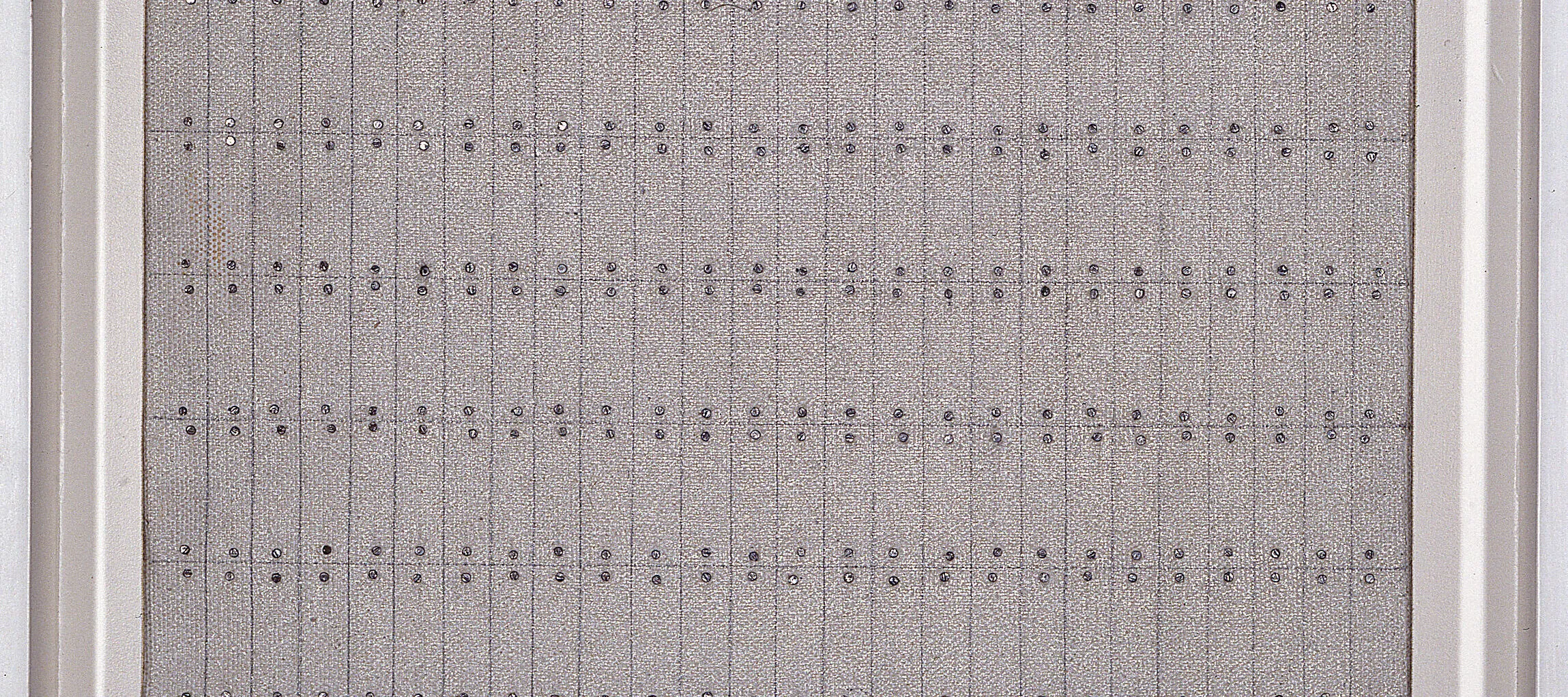 Painting with nine by twenty-six grids formed by pencil on a textured, gray background. Tiny silver nail heads hug the top and bottom of each section. Exact in design, the effect is one of imperfection as the lines are not perfectly straight and the nails do not totally line up.