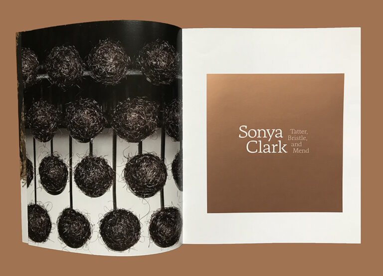 Look inside a book with a photograph of an organic art work on one page and the title "Sonya Clark."