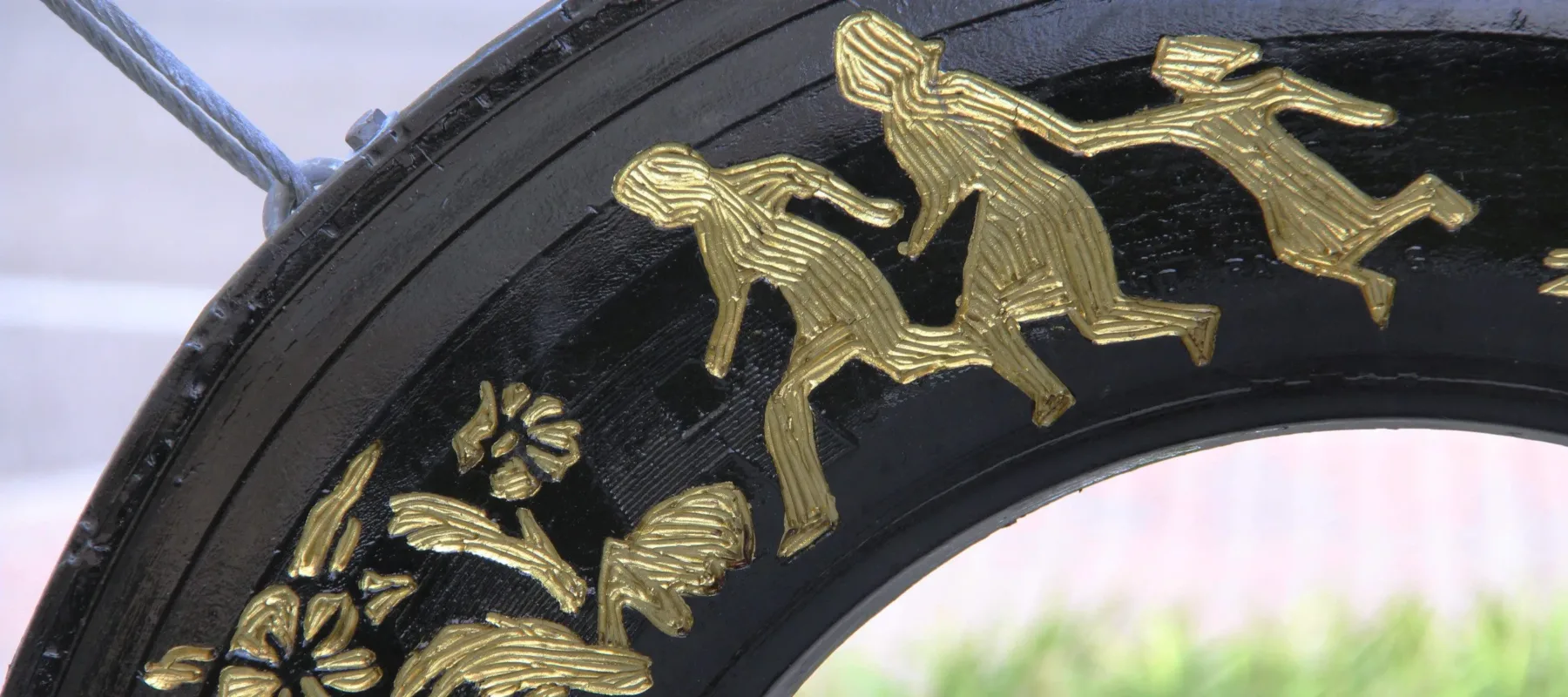 Betsabeé Romero, <i>Huellas y cicatricez (Traces and scars)</i> (detail), 2018; Four tires with engraving and gold leaf and steel support, approx. 192 1/2 x 86 5/8 x 9 3/4 in.; Courtesy Betsabeé Romero Art Studio; Photo by Mara Kurlandsky, NMWA