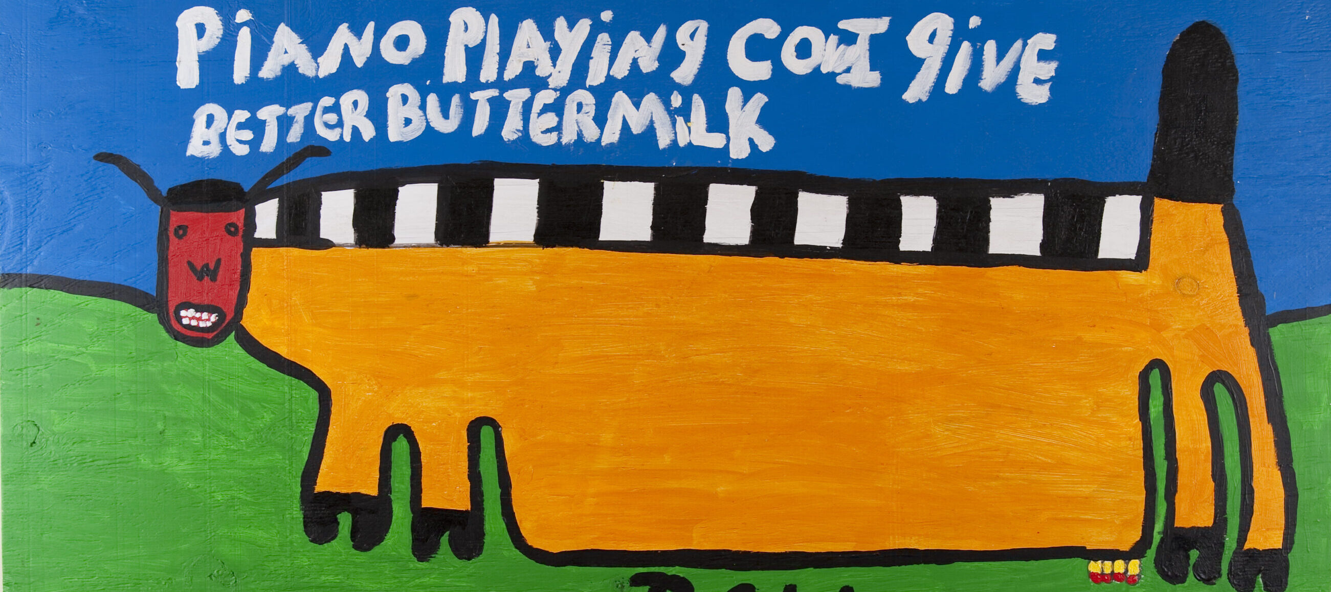 A four-legged, cow-like, rectangular creature stands on a green field, above the initials R.C.W. It has a black and white striped back, golden body, black tail, red humanoid face, black hooves, and udder. It is under a blue sky and the white words ‘piano playing cow I give better buttermilk.'