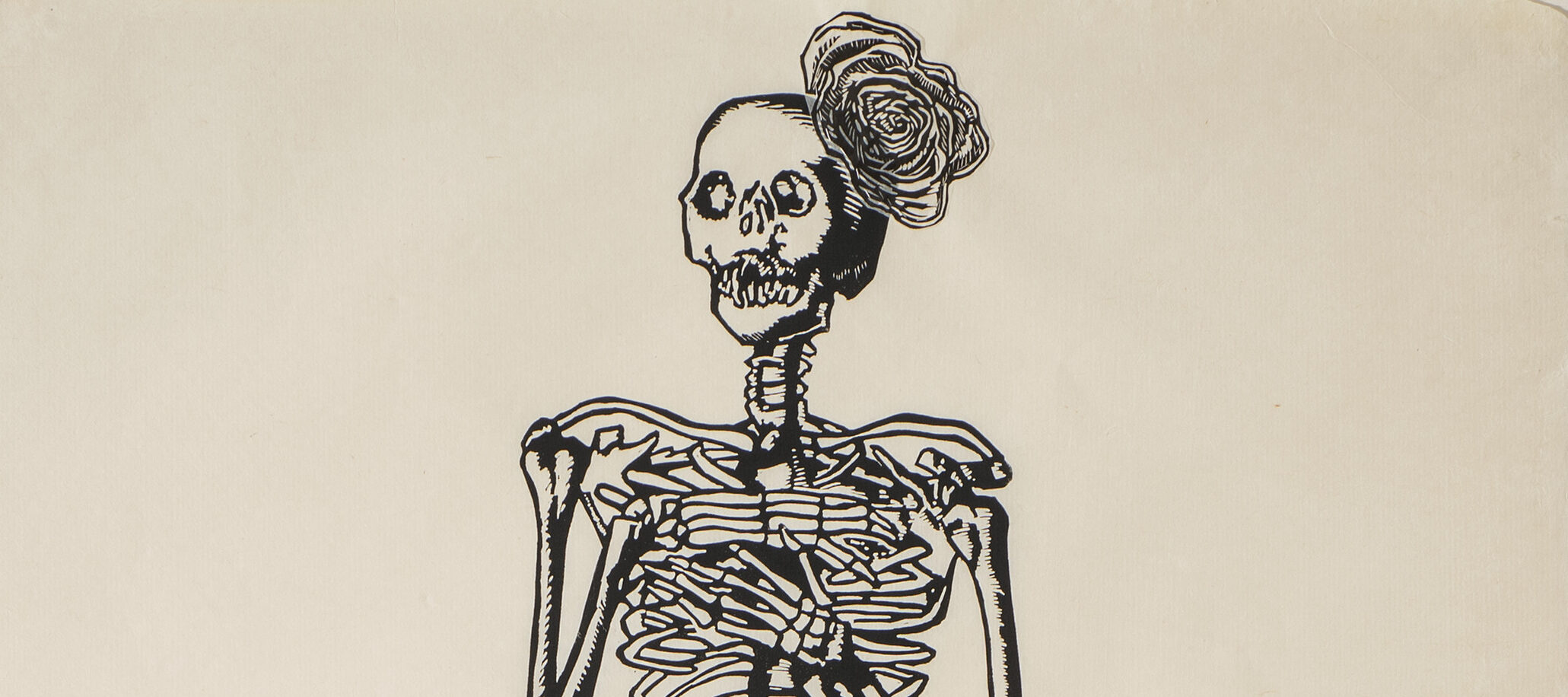A very tall and narrow, black-and-white print depicts a skeleton with folded arms and a rose fascinator perched on its head. The figure wears a collaged, three-dimensional, billowing skirt made of tissue and printed with roses.