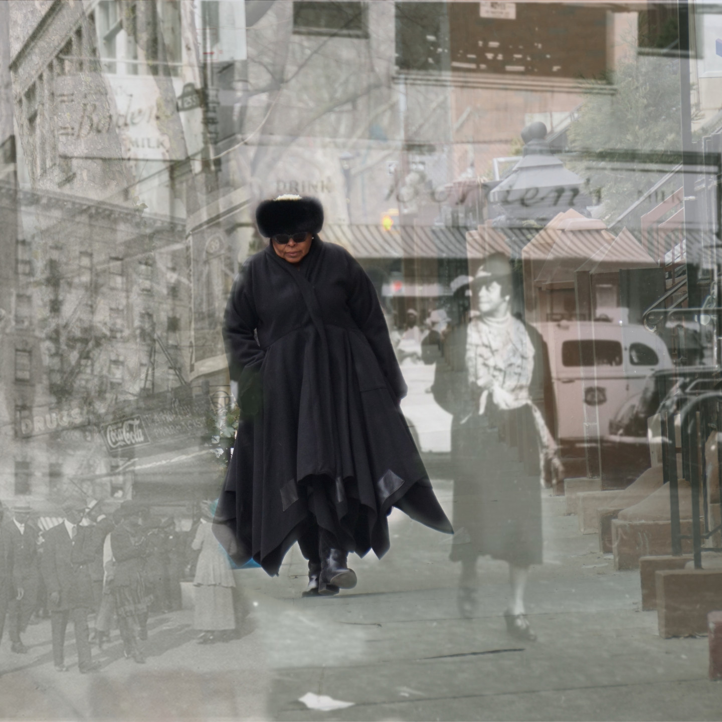 A photo montage shows a present-day individual with dark skin and clothing walking and is overlayed on a historical black-and-white photograph of a city neighborhood. The present-day individual appears to walk next to an individual in the historical photo.