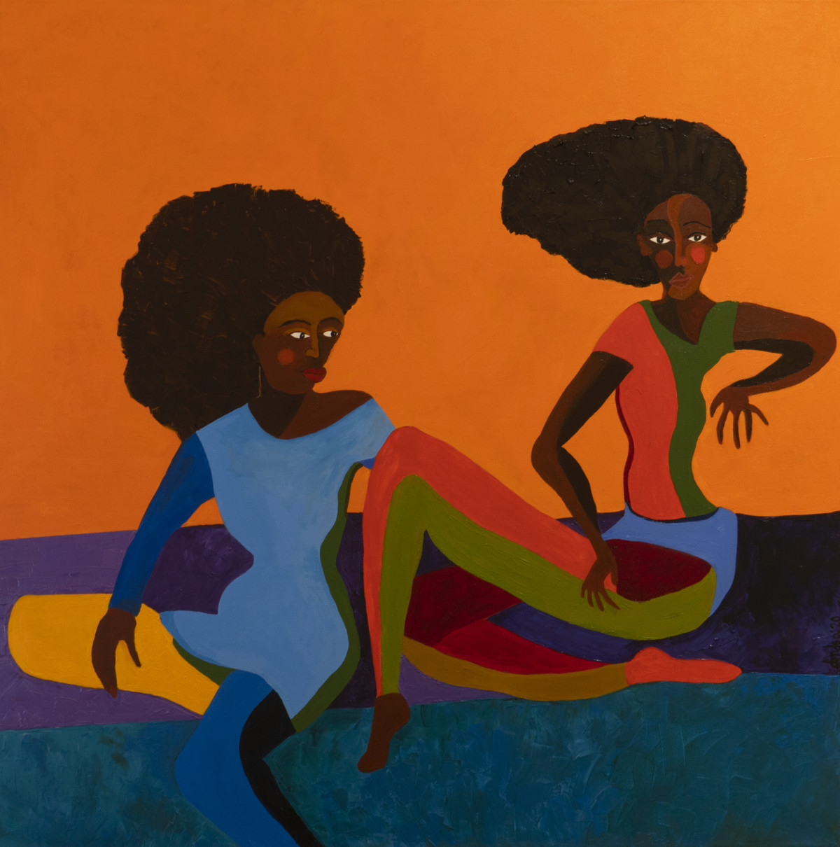 A colorful figurative painting features two dark-skinned women sitting in a relaxed manner atop a blue and purple floor. They both have large afros and wear color-blocked outfits: the woman on the left a blue and green dress, and the woman on the right a peach and green shirt and pant set. The painting's background is a bright orange.