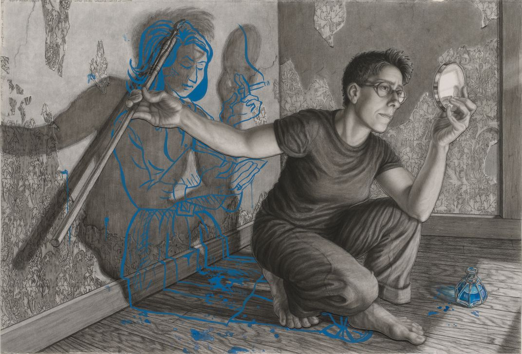 A figurative painting/drawing features a light-skinned woman with a cropped hair cut crouched on a wooden floor in the corner of a room. She is rendered in pencil or charcoal, as is the floor and walls around her. However, her left arm reaches behind her towards the back wall that she faces away from. It holds a paintbruch that is touching blue paint or ink that makes up the sketch of a second woman rendered on the wall with her waist bleeding into the floor. She looks down at a book in her hands and holds a cigarette. The main figure holds a small circular mirror and seems to be looking back at her creation.