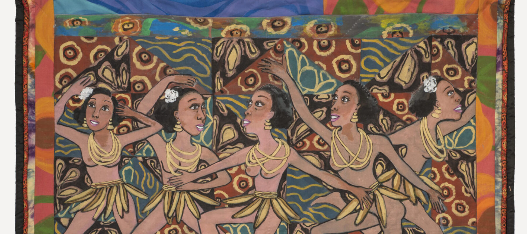 Colorful quilt with a multi-patterned background that depicts five medium skin toned, bare breasted dancing women wearing skirts of bananas and yellow necklaces. Below, from left to right, a medium-dark skin toned and light skin toned men and women interact and play brass instruments.