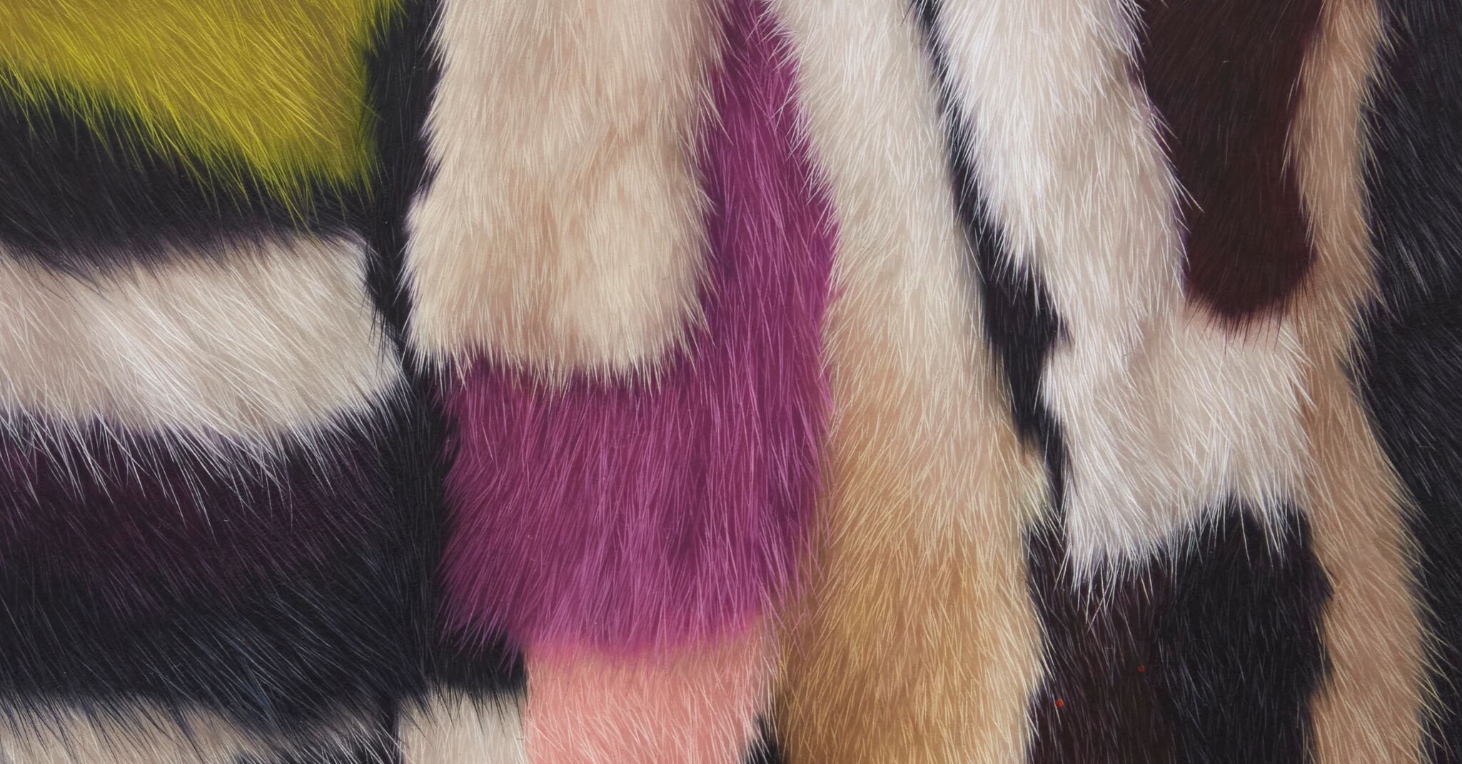 A detail of a small oil painting of colorful fur in swatches of yellow, purple, pink, beige, black, and white. Each hair is visible, creating a hyper-realistic portrayal.