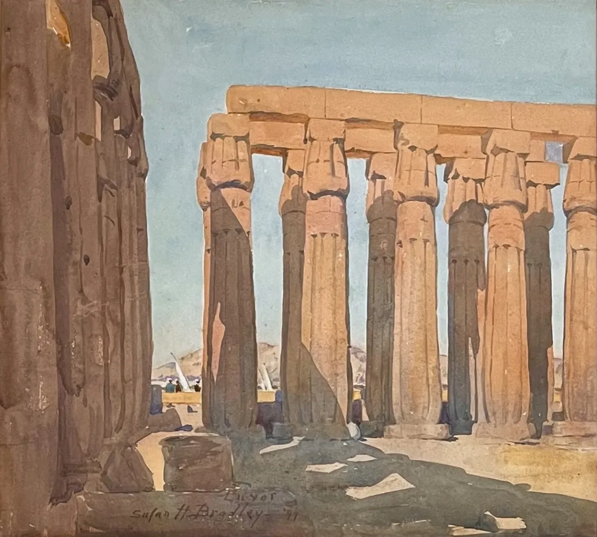 A watercolor painting features a scene of ancient Egyptian columns painted in an earth-tone, half lit from the sun and half under shadows from the structures surrounding it. The sky is a clear blue.