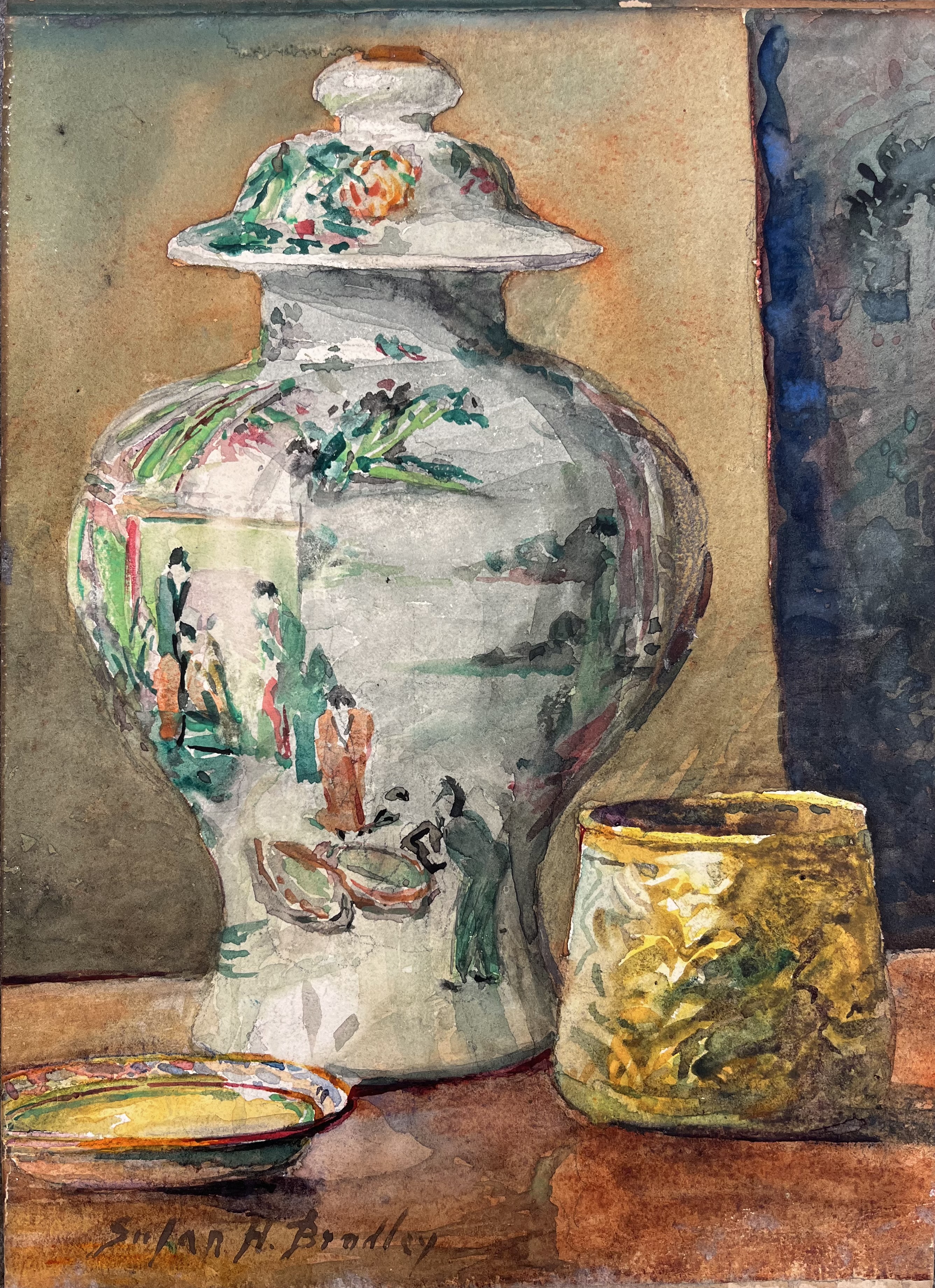 A watercolor painting features a tall vase painted in an Asian motif of people and flowers standing on a table next to smaller gold jar and dish.