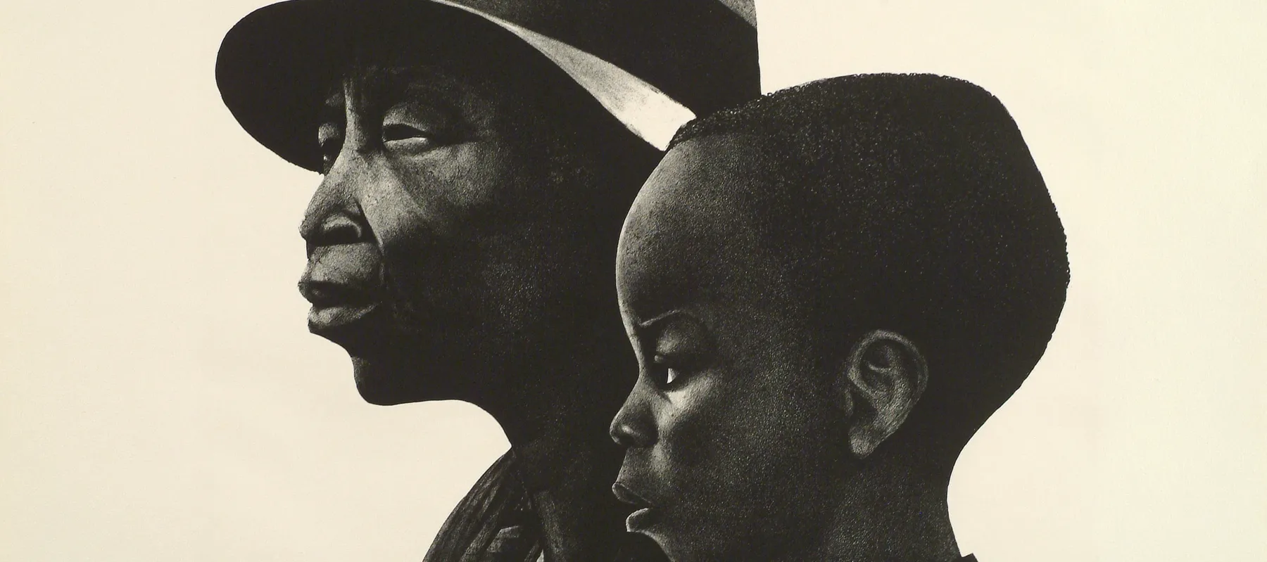 A black-and-white print of two dark-skinned individuals in profile, facing left. The person in the background is an older adult wearing a brimmed hat, and in the foreground and slightly to the right is a young child with coarse hair cut close to the head.