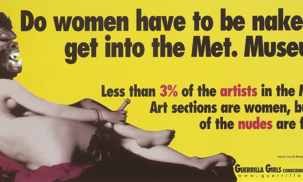 Reclining light skinned nude woman seen from behind wearing a gorilla mask on bright yellow background. Large black text reads, "Do women have to be naked to get into the Met. Museum?" Smaller black and red text reads, "Less than 3% of artists in the Modern Art sections are women, but 83% of the nudes are female."