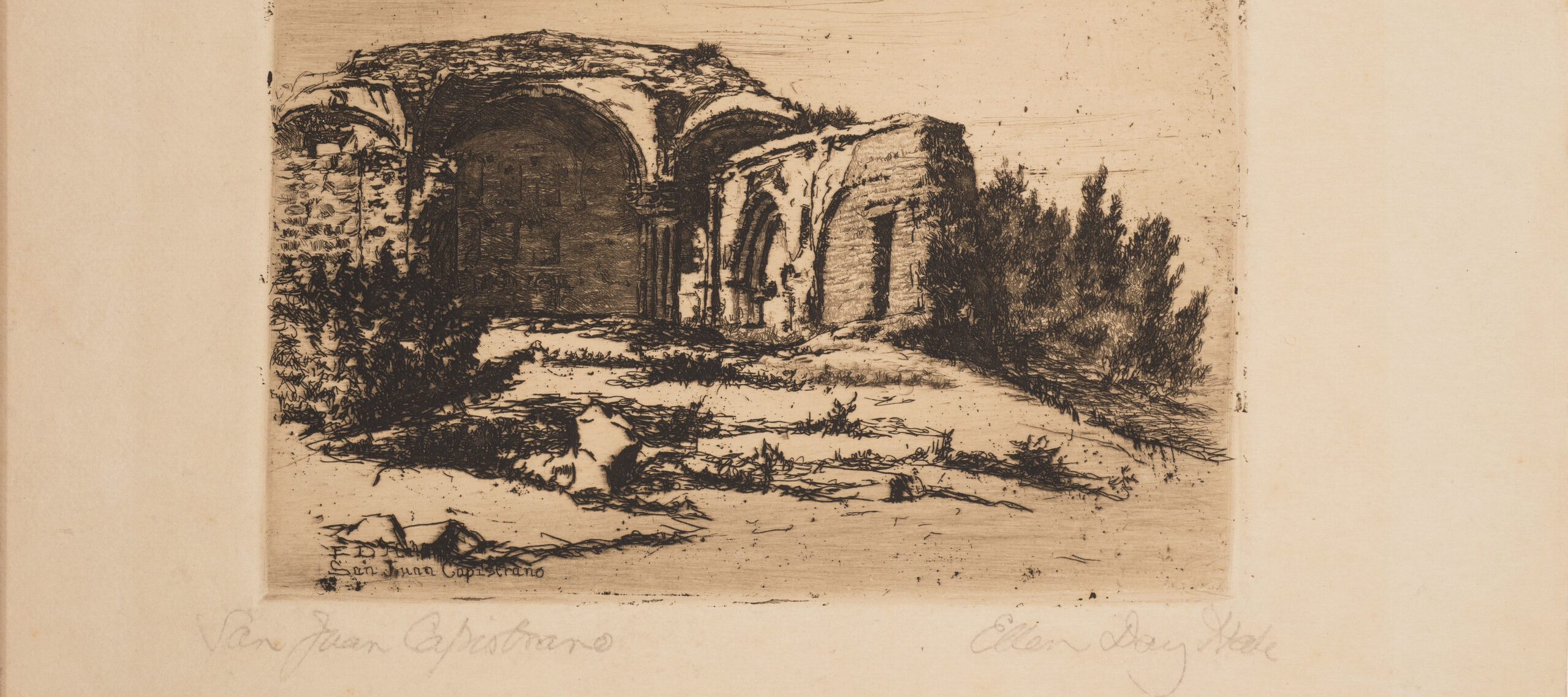 Small print of black ink on ecru paper depicting the ruins of an old Catholic mission building. The building, featuring rounded arches, crumbling facades, and exposed brick, is surrounded by scrub bushes and desert landscape.