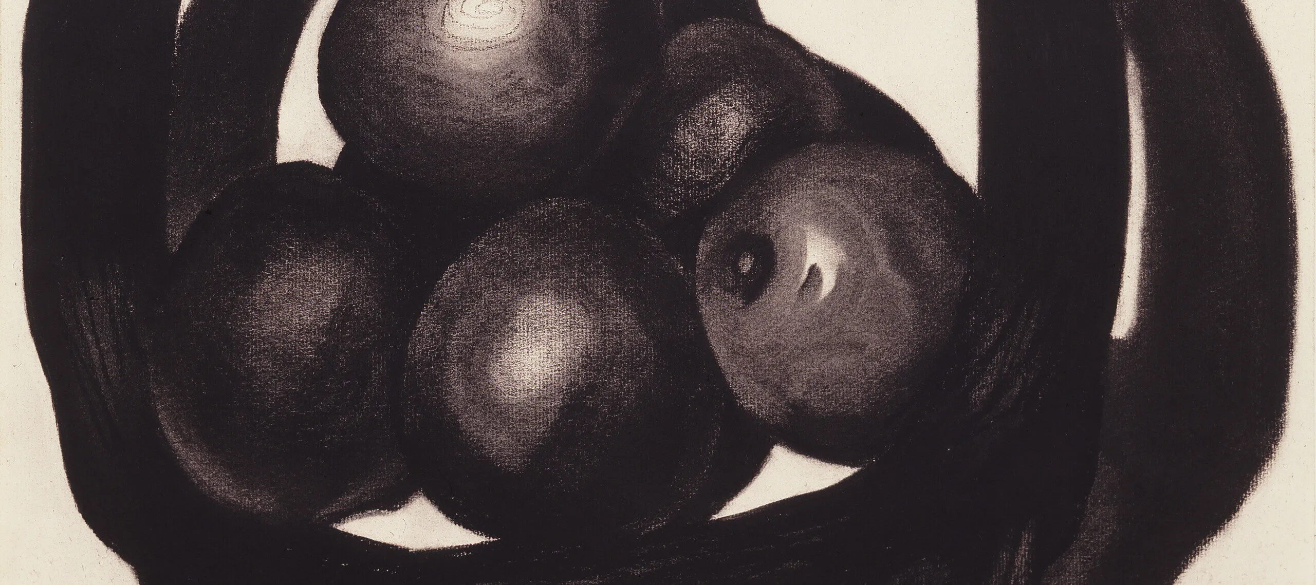 A still life of avocados in a basket rendered in charcoal on a white ground uses radically simplified forms. Two offset circles evoke a basket and its shadow. Within the circles, ovals highlighted to imply 3 dimensions, seem to hover above, not sit within, the basket interior.