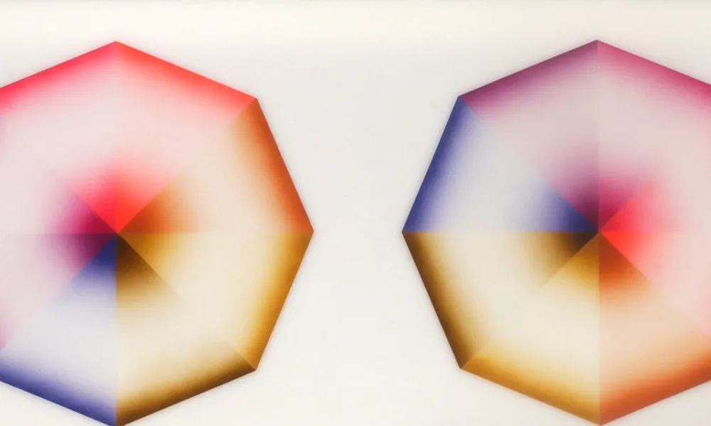 Four hard-edged octagons, each divided into eight pie-slice shapes painted red, pink, orange, yellow, olive green, blue, violet, or lavender, occupy a square, white background. Dark at the wide and narrow ends of each wedge, the hues create the illusion of 3-dimensional forms.