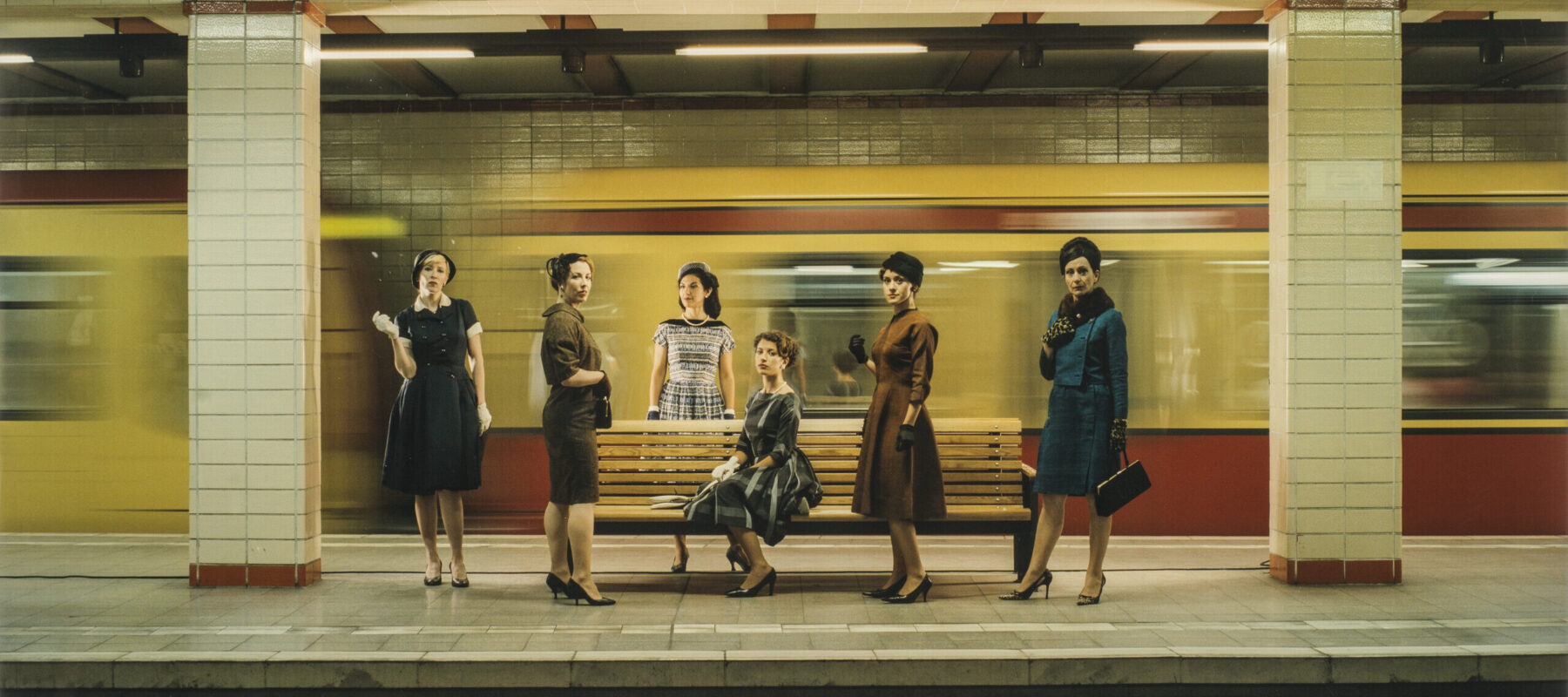 Eve Sussman, <i>Women in S-Bahn</i> (Photographic still from <i>The Rape of the Sabine Women</i>), 2005; Chromogenic color print, 39 3/8 x 51 1/4 in.; National Museum of Women in the Arts, Gift of Heather and Tony Podesta Collection; Photo by Lee Stalsworth