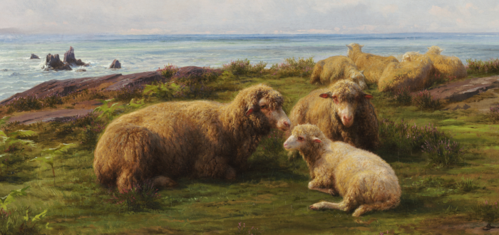 A flock of sheep rest on a green hill by the sea. In the center, two adults and a lamb lie in a group. Flat rocks are visible through the grass. The sky has rolling clouds, and a breeze is suggested by the waves crashing on rocks in the sea, which stretches to the horizon.