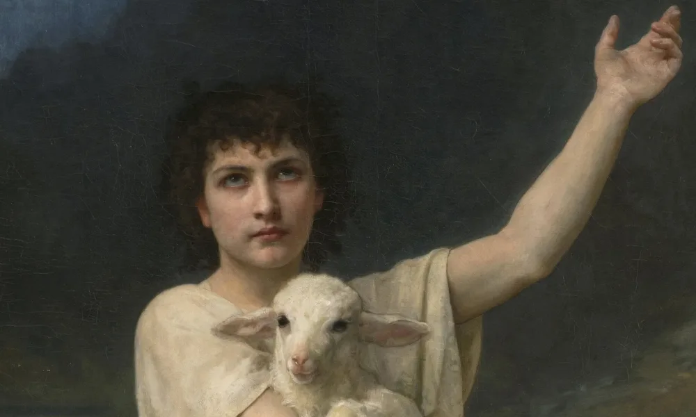 Realistic painting depicts a light-skinned young man with dark curly hair, wearing a white tunic, set before distant mountains. He is kneeling victoriously atop a fearsome dead lion, clutching a serene lamb his right arm and gesturing heavenward with his left arm.