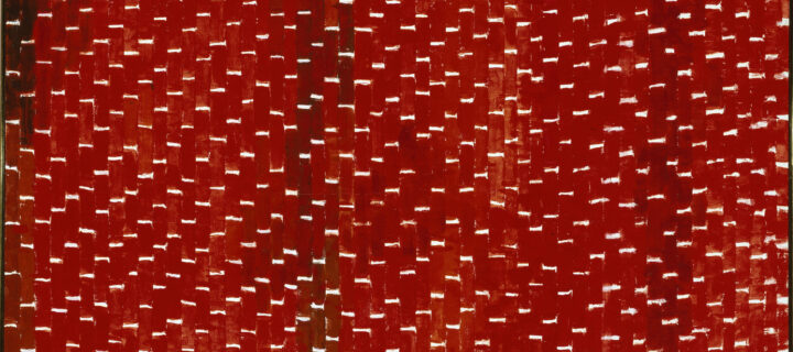 Painting features vertical tile-shaped brushstrokes in various shades of red separated by horizontal white lines. Creating a rhythmic and mosaic-like pattern that resembles stitching, the white lines create stair steps in the lower right corner, separating as they move towards the center.