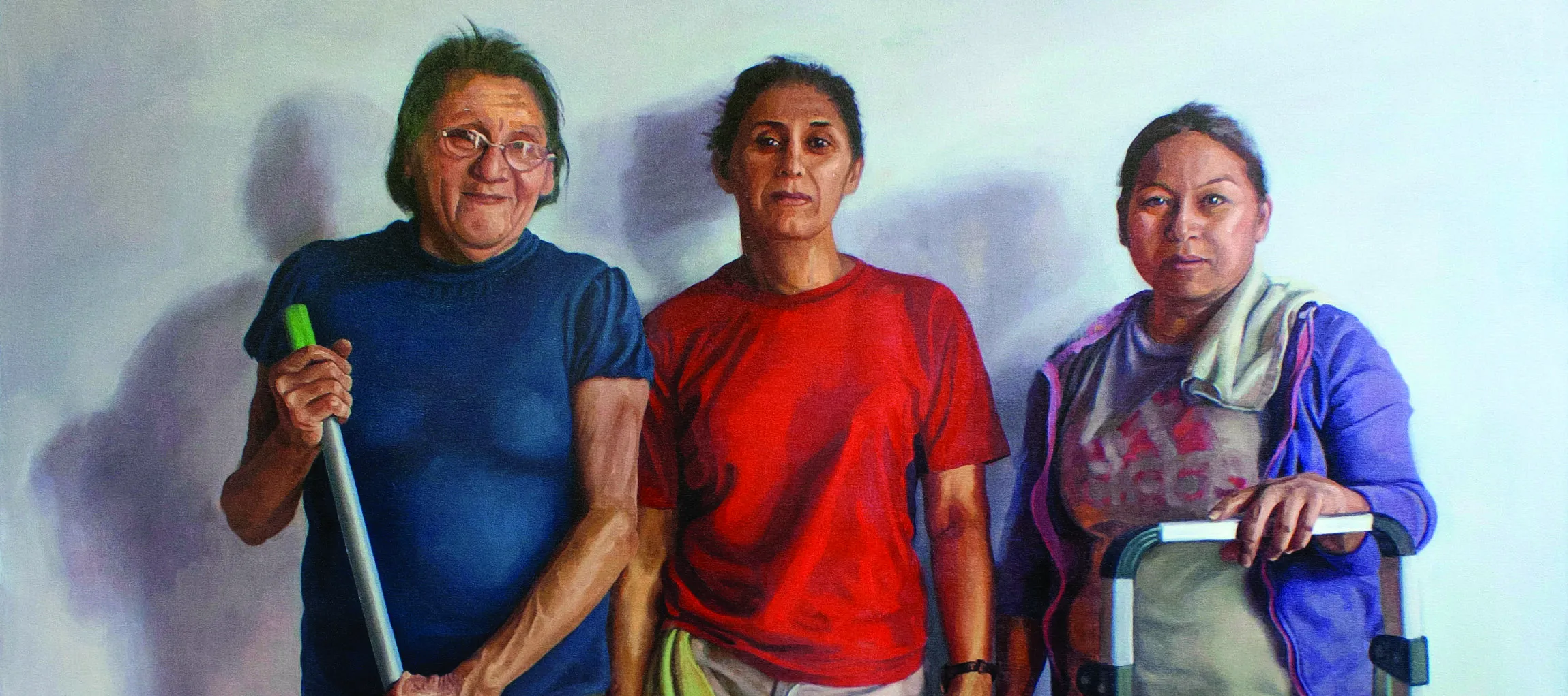 An oil painting of three women standing against a white wall, looking at the viewer. The women are wearing casual clothes and have medium skin and dark, tied-back hair. The woman on the left is older and holds a mop to the ground with both hands. The woman in the middle holds a spray bottle and rag. The woman on the right rests her arm on the back of a folded metal chair.